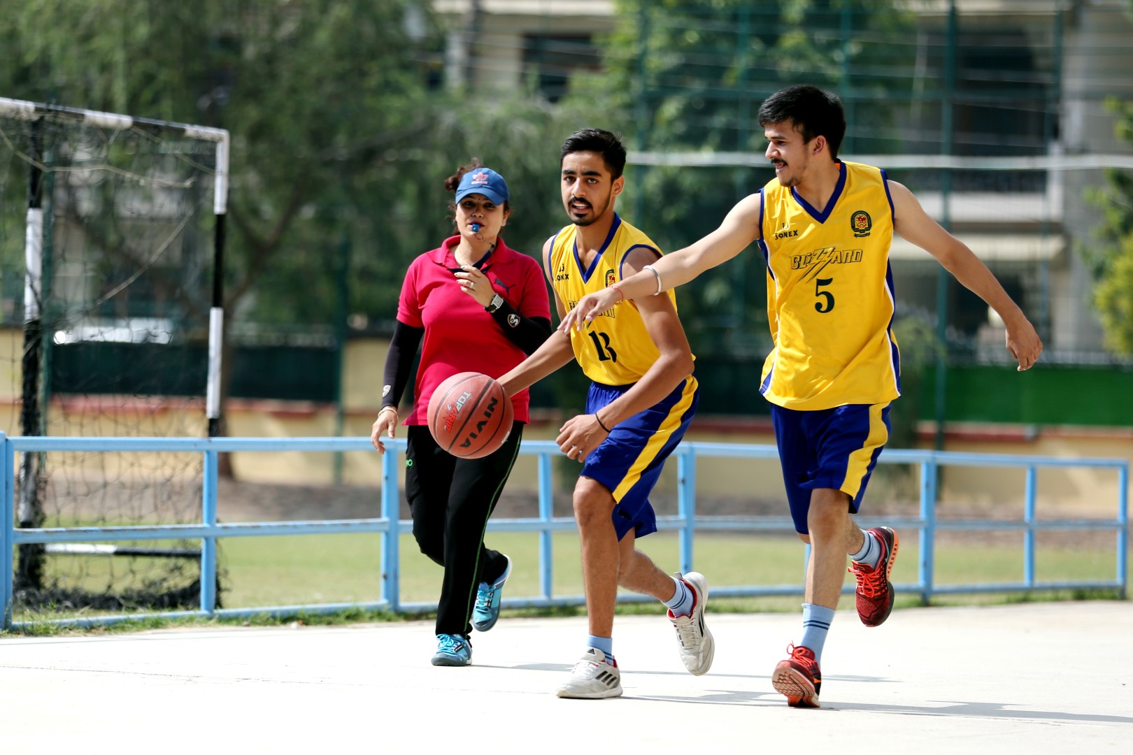 student smiling and using hand gestures