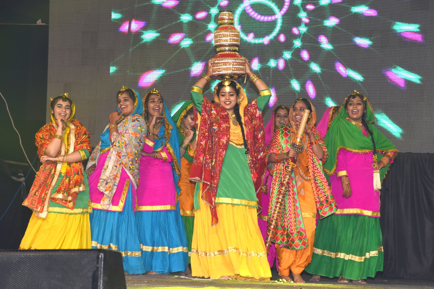 student smiling and using hand gestures