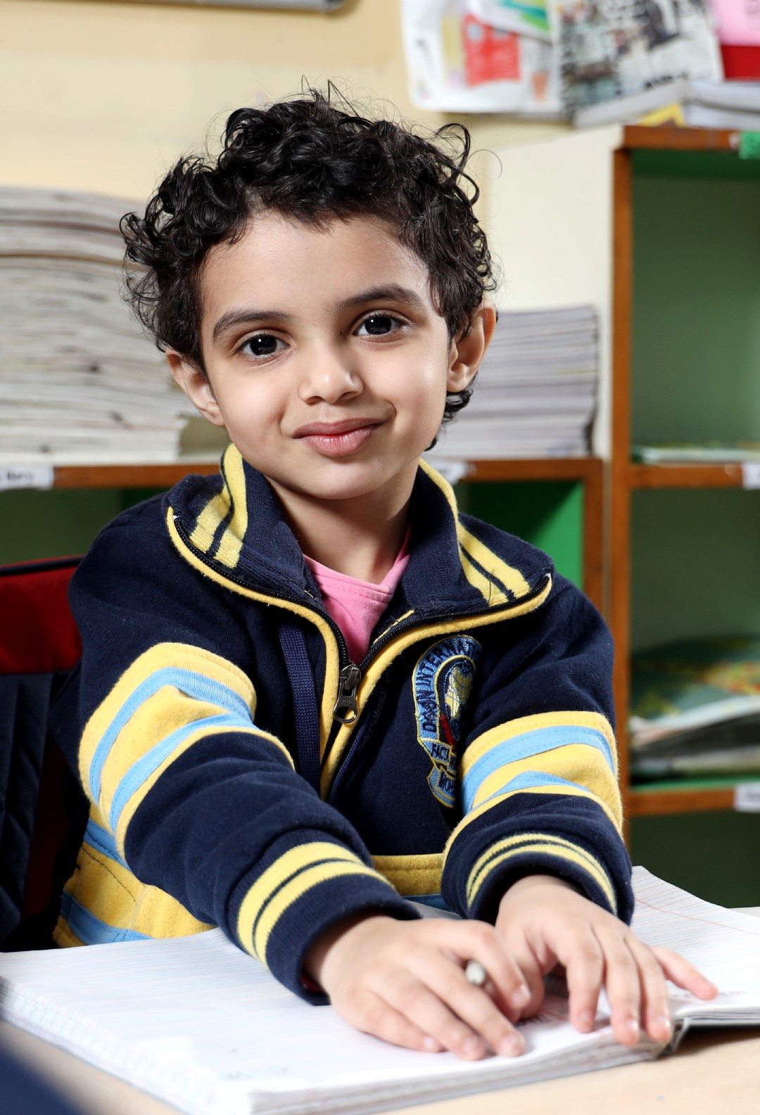 2 students talking and smiling