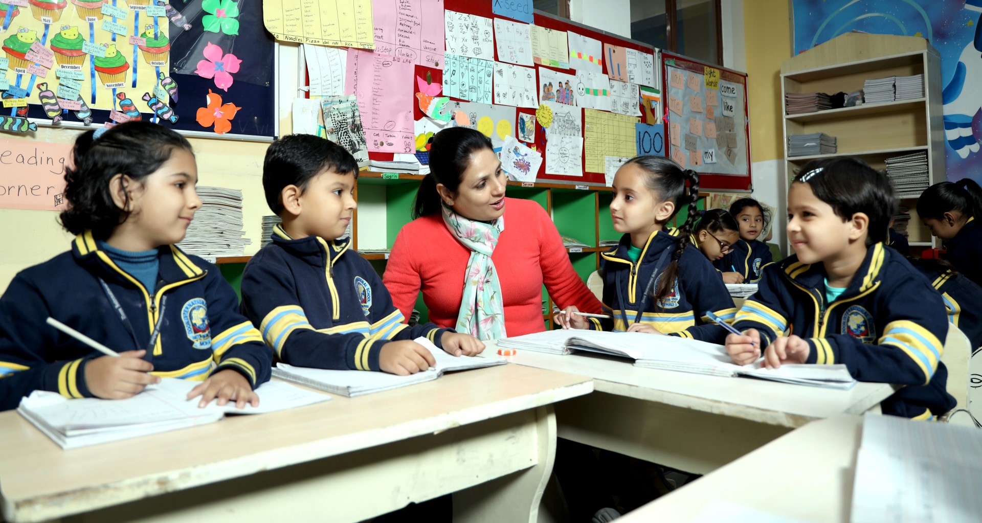 2 students talking and smiling