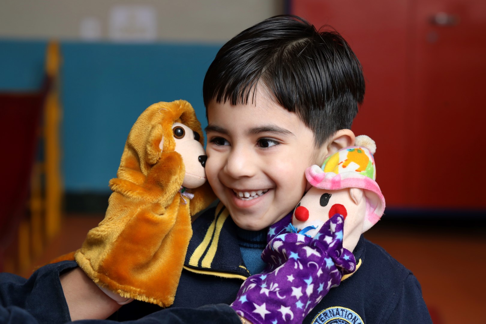 2 students talking and smiling