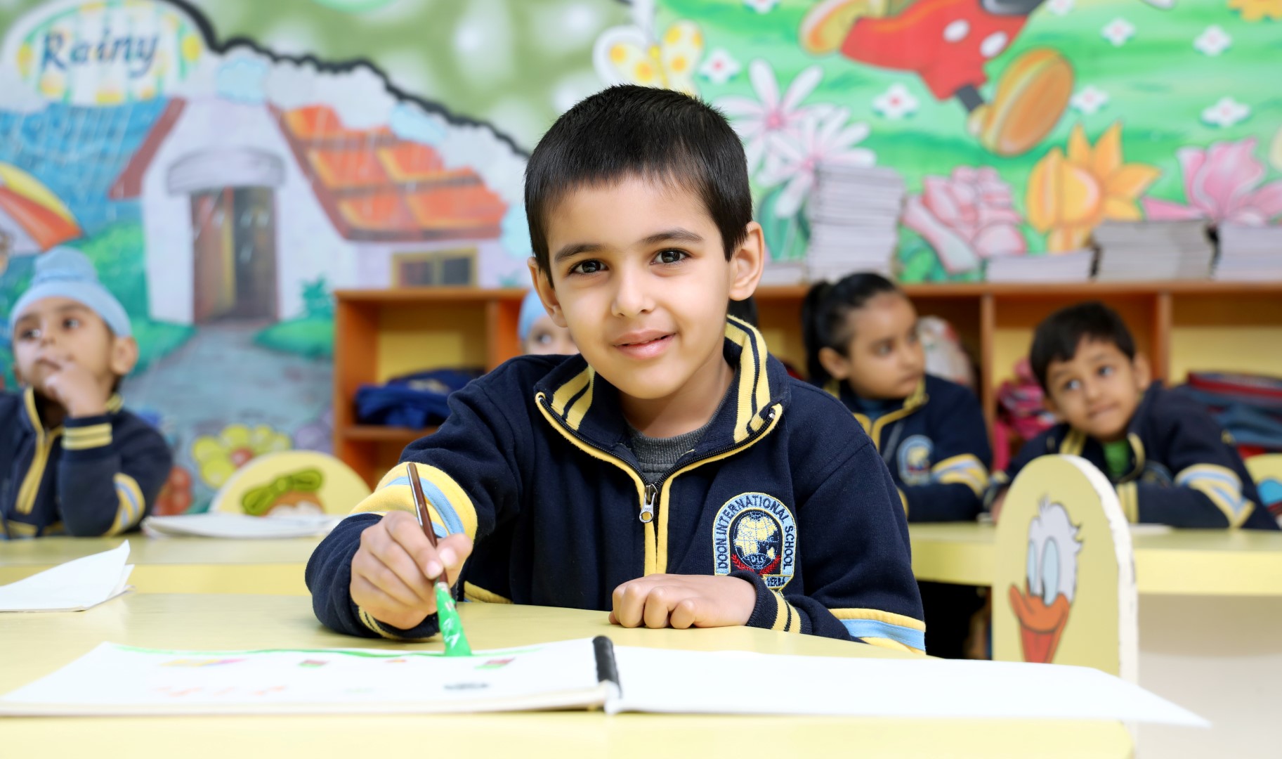 2 students talking and smiling