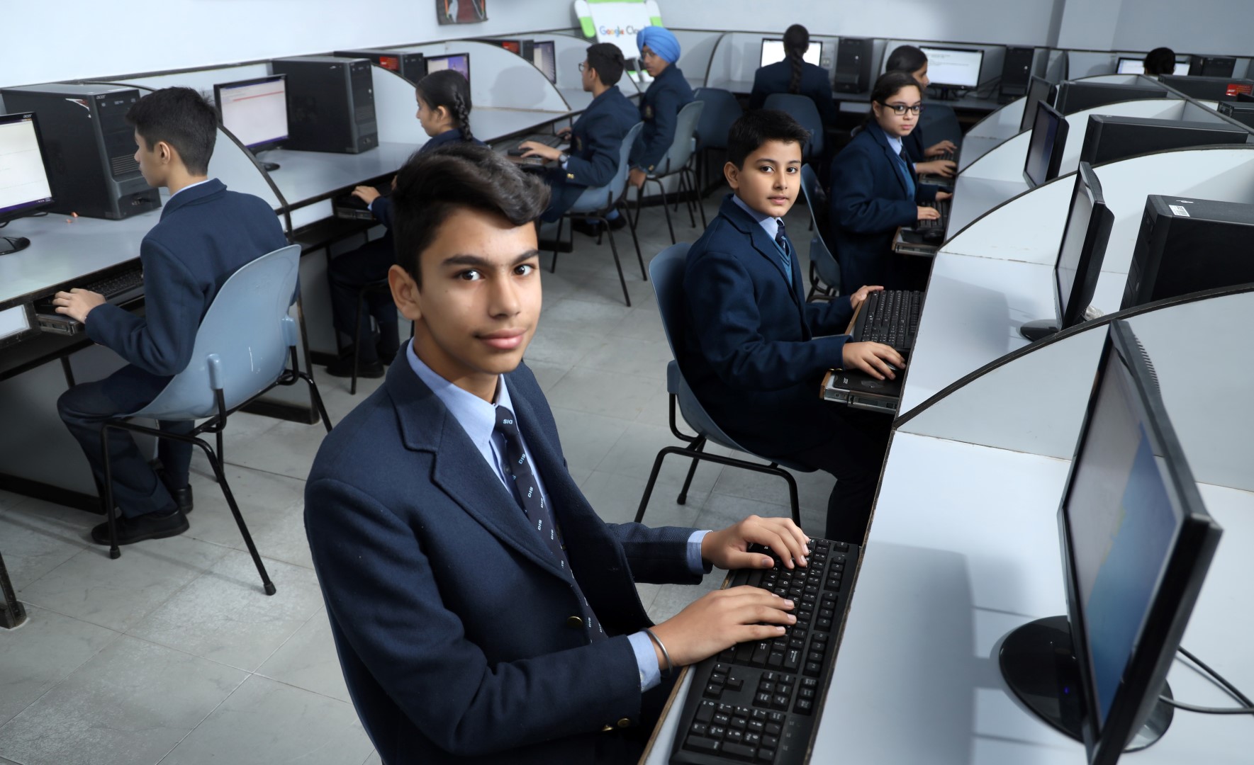 2 students talking and smiling