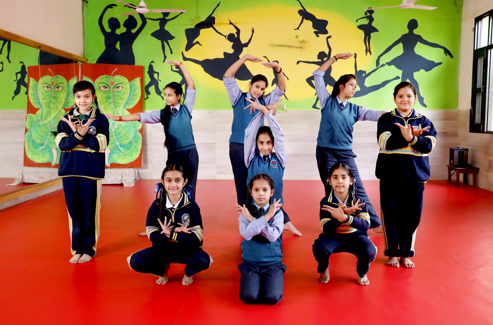 2 students talking and smiling