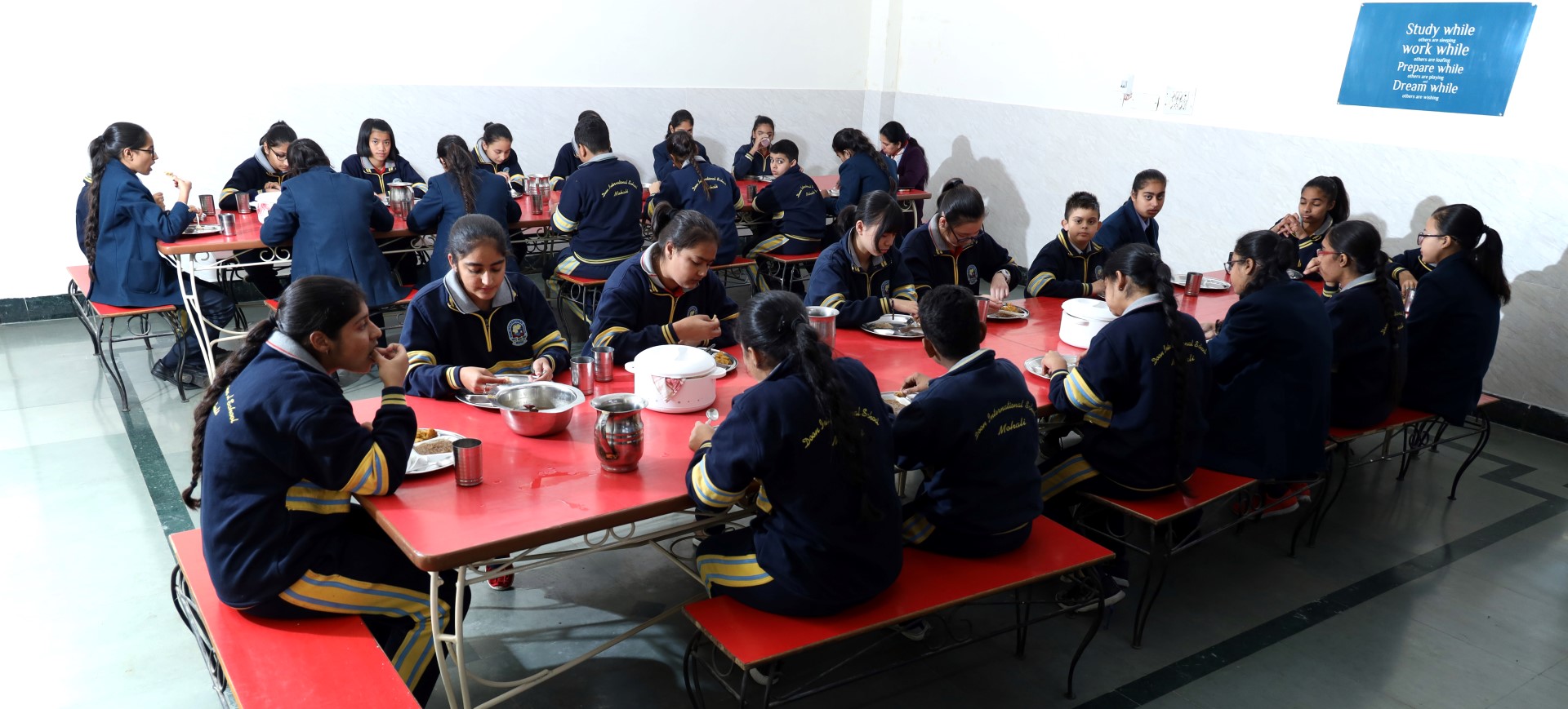 2 students talking and smiling