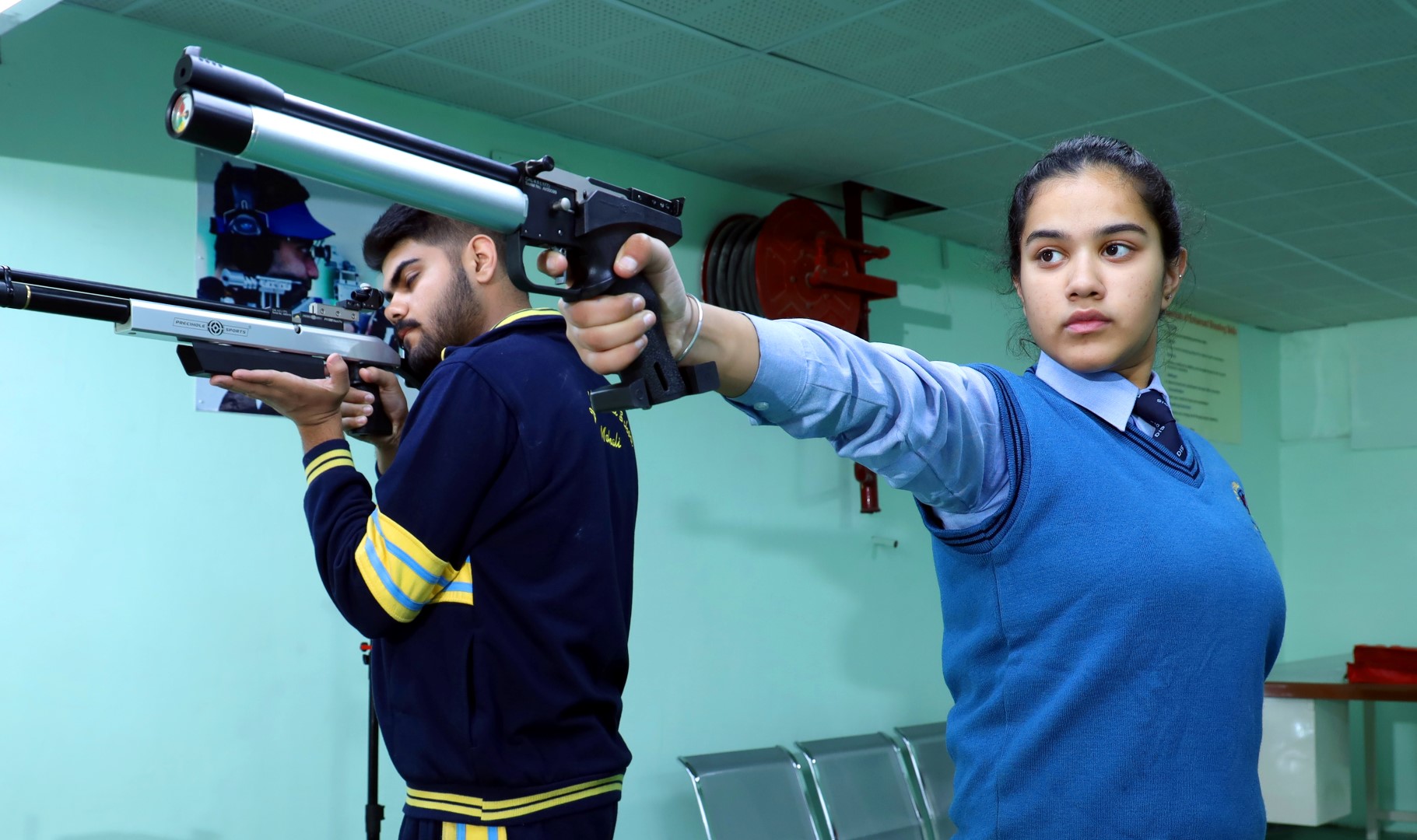 2 students talking and smiling
