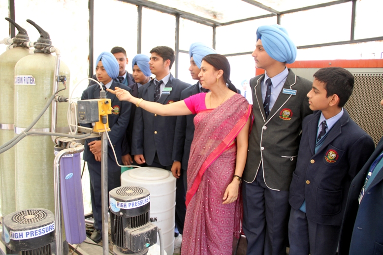 2 students talking and smiling